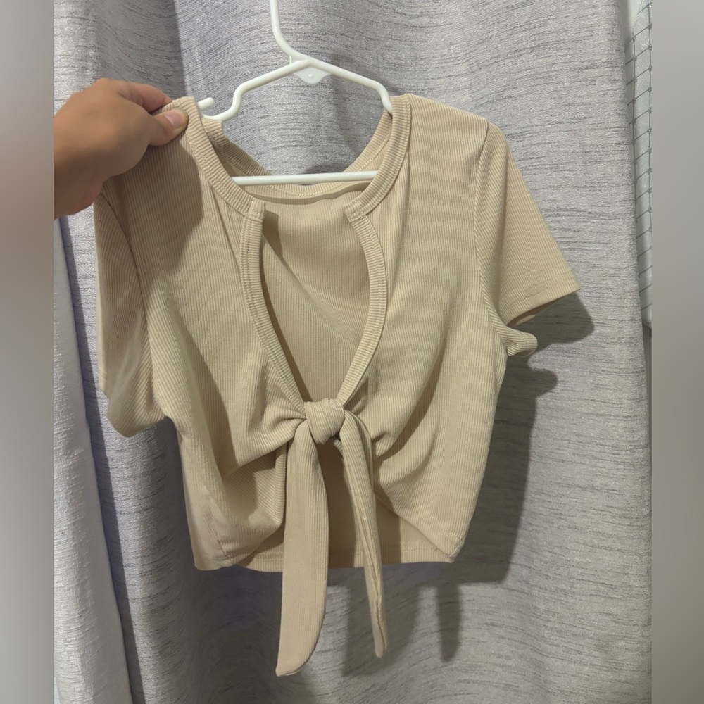 From shein Crop beige top , adjustable , Wore few times , still looks brand new